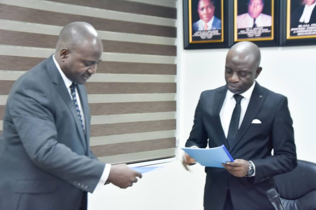 Erebe hand over the affairs of the Ministry of Justice to the newly appointed Attorney -General and Commissioner for Justice of Delta State, Ekemejero Ohwovoriole